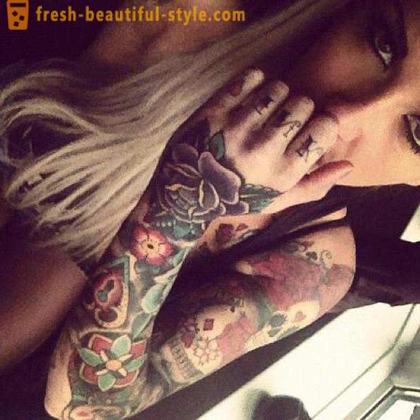 Dámske tetovanie na paži: atraktívne výraz